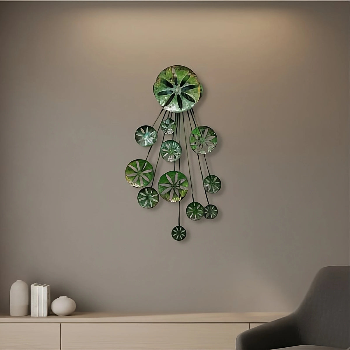 Decorative wall art with green circular sand dollar patterns on a beige wall.