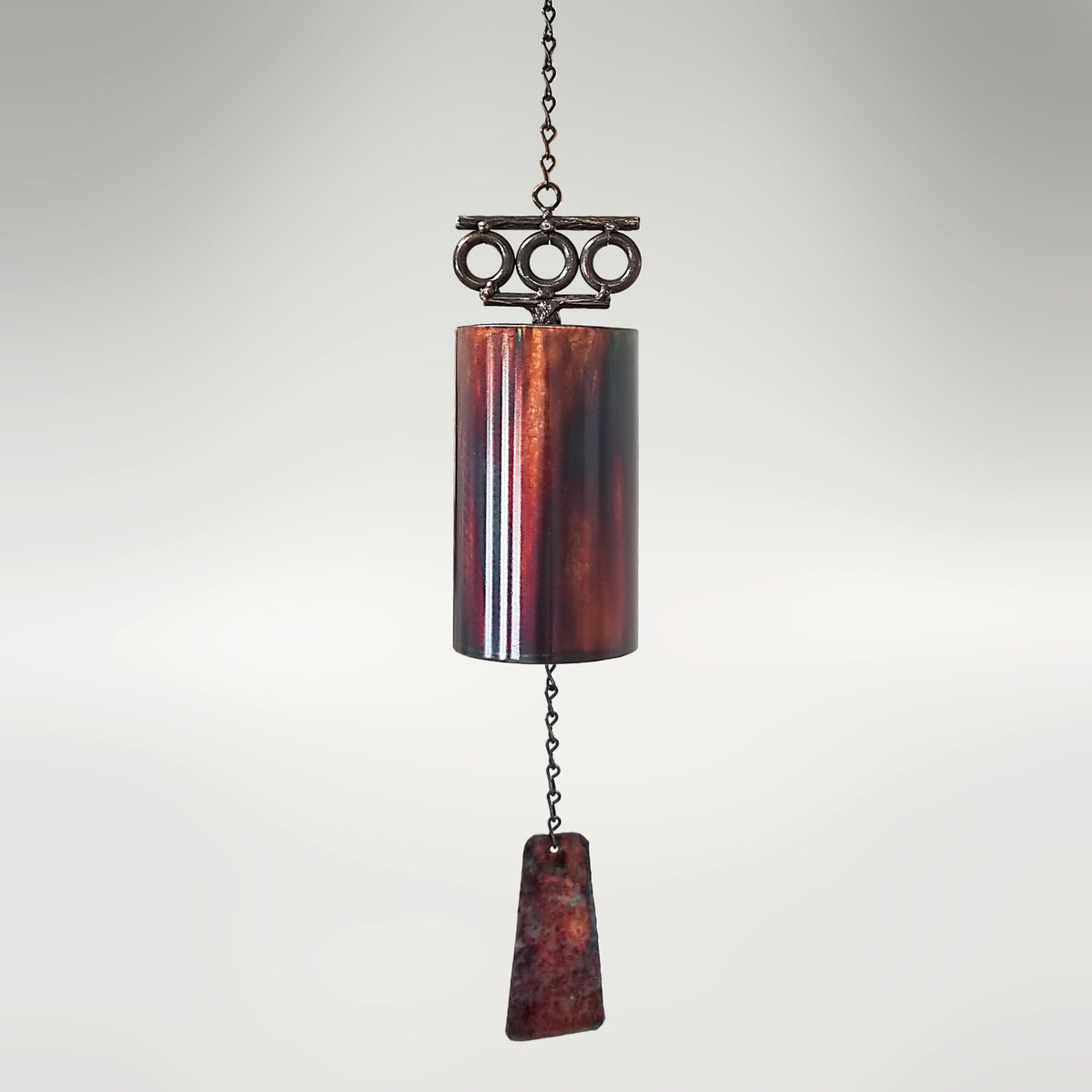 30-inch San Martin Mission Bell by Marc Staples: A hand-forged steel acoustic sculpture featuring a weathered torched-copper patina and an original monogrammed windsail.